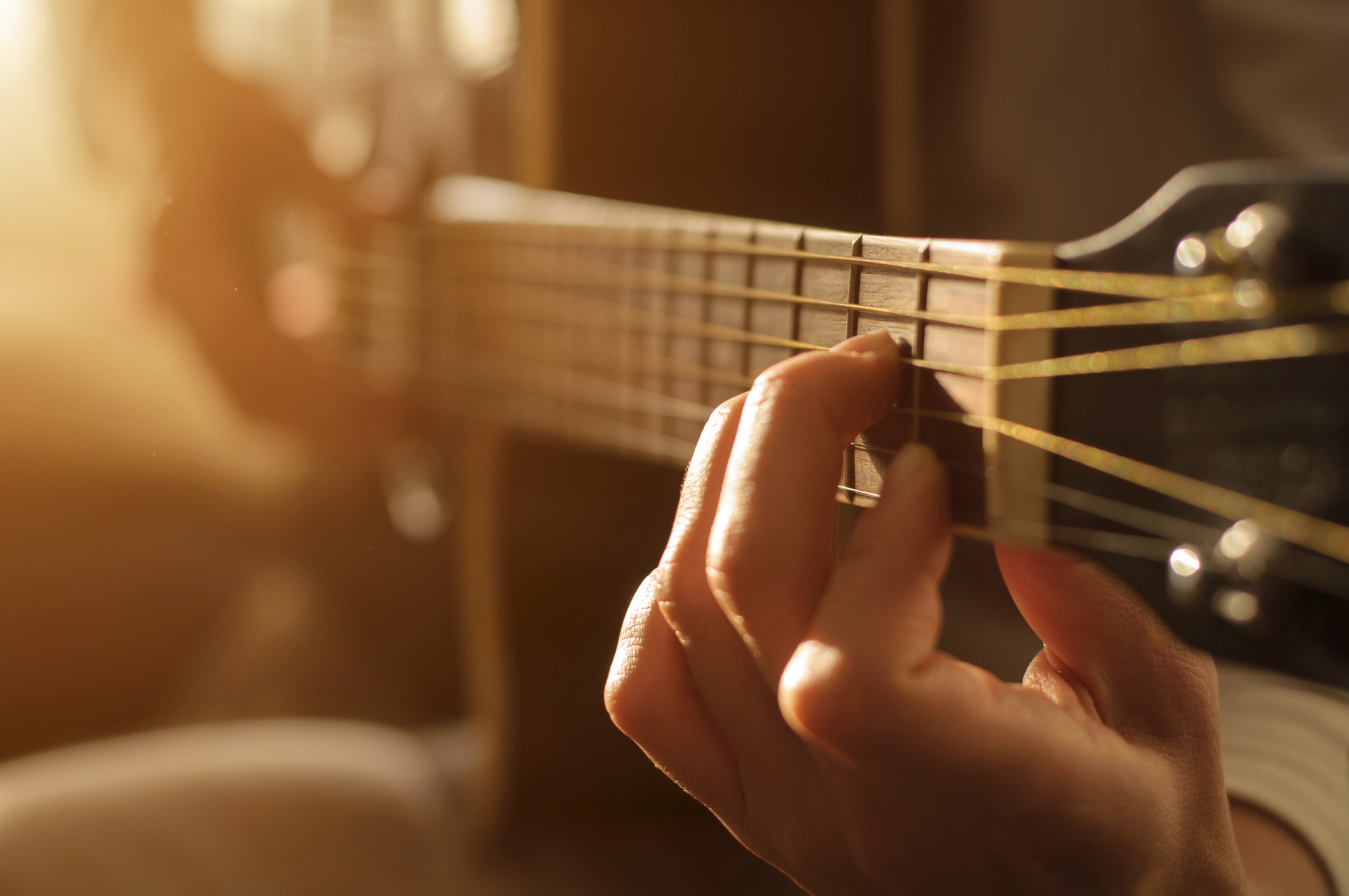 playing acoustic guitar