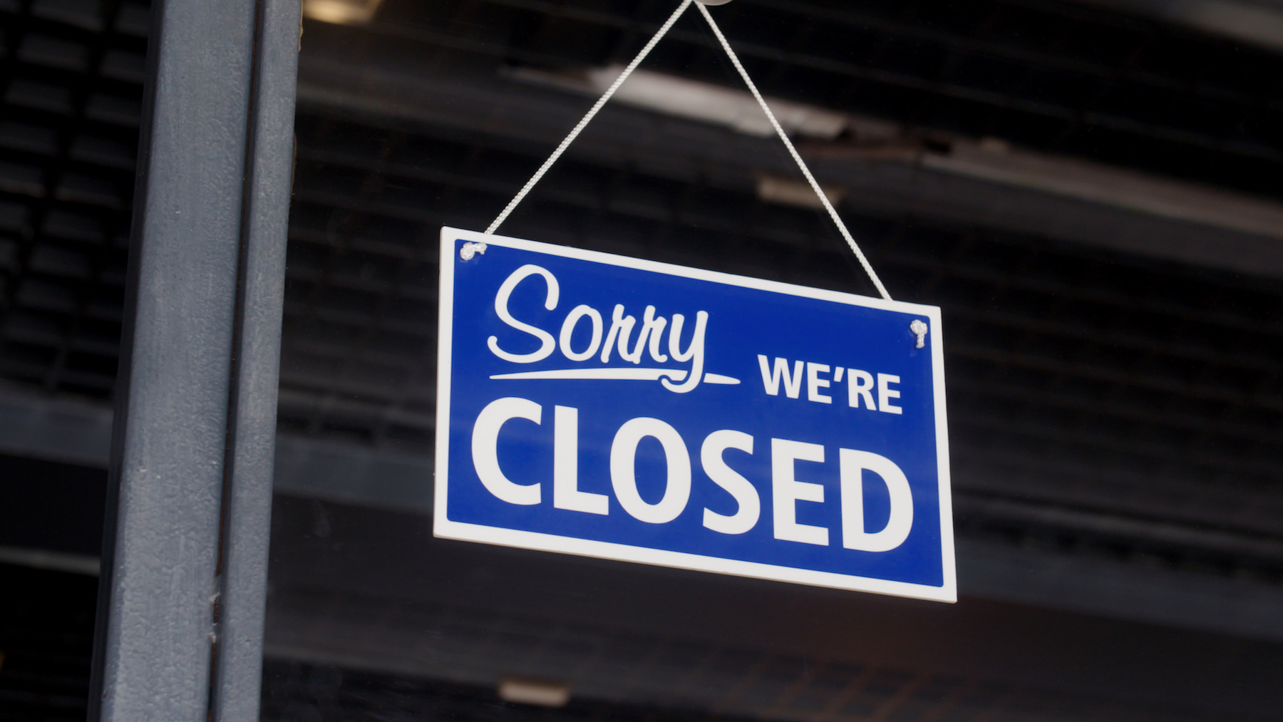 Closed sign on the shop's window