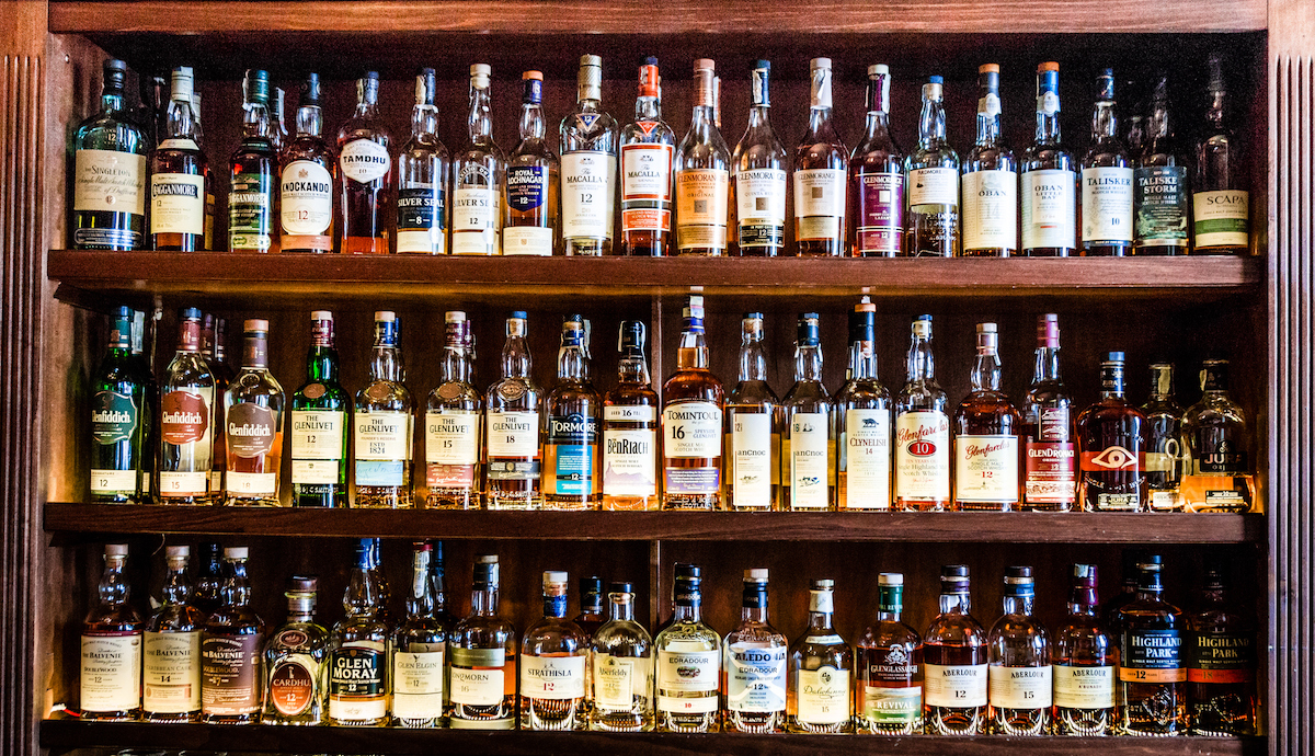 Large selection of Scottish malt whisky at the bar