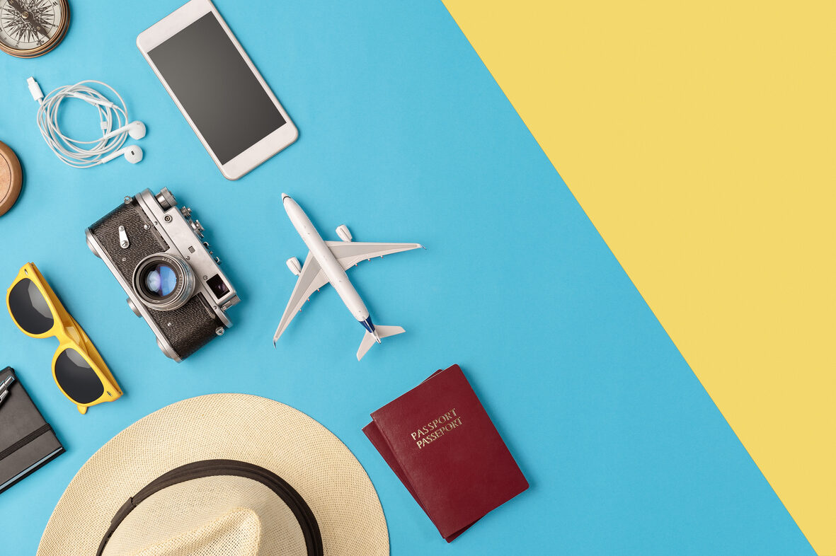 Travel accessories flat lay with copy space