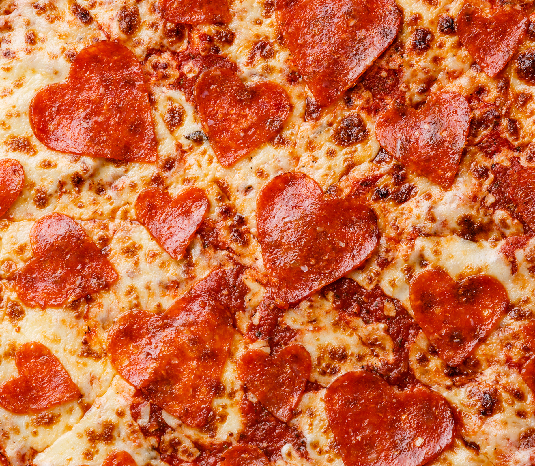 Heart shape Pepperoni Pizza background