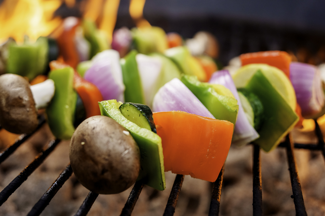 Vegan Kebabs with Onion , Bell Pepper and Mushroom on a Fiery Charcoal Grill