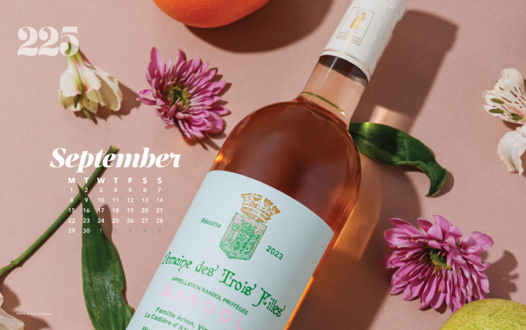 Wine bottle wallpaper with pink background and flowers